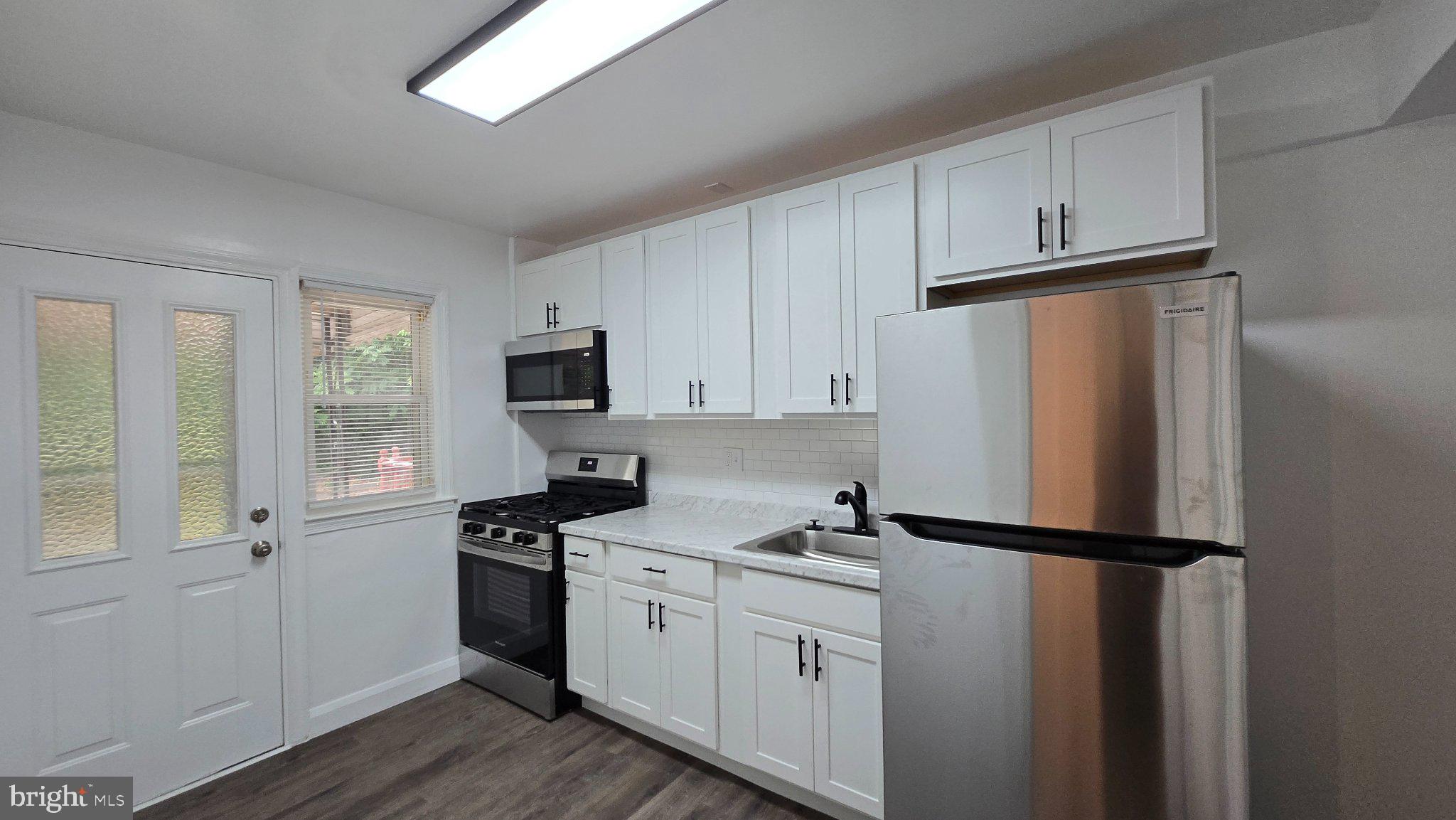 3820 Elkader Road Baltimore, MD 21218 - Photo 7 of 41 Modern kitchen with sleek finishes.