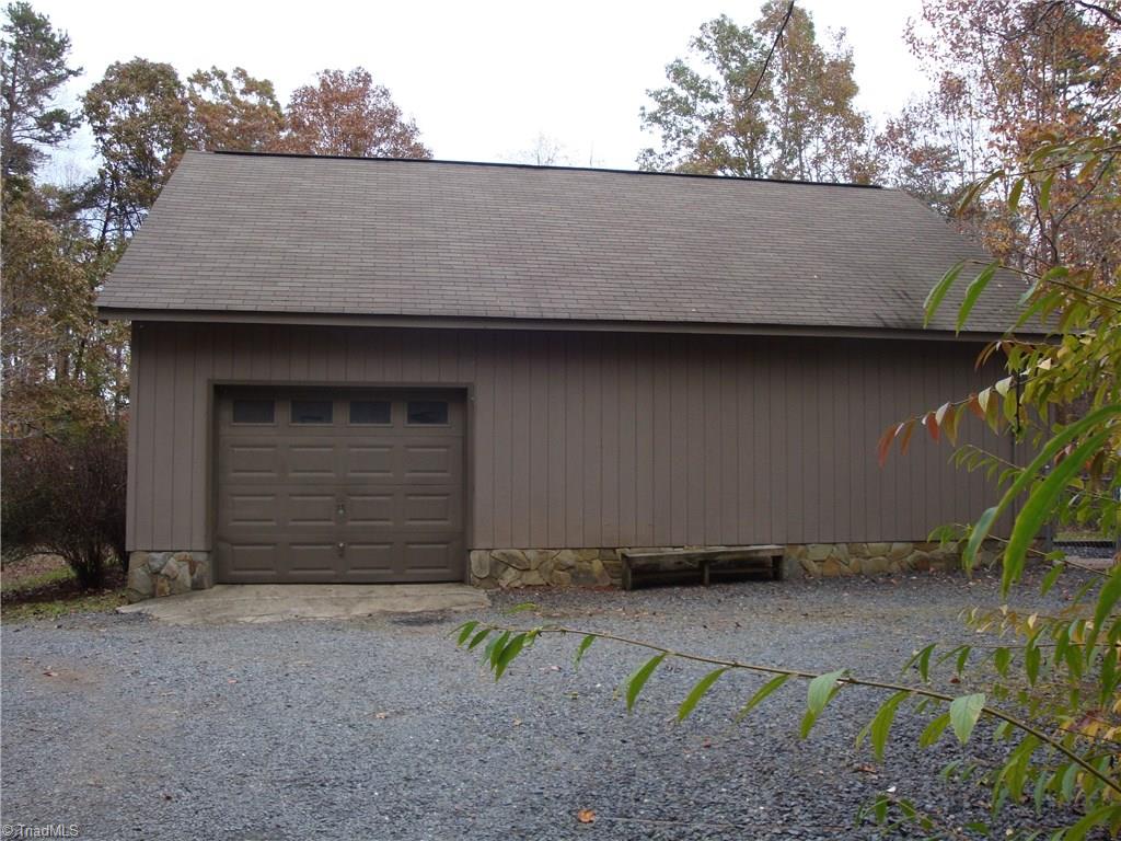 5342 Fred Lineberry Road Randleman, NC 27317 - Photo 14 of 16 DETACHED GARAGE/WORKSHOP WITH A LEAN-TO ON BACK OF BUILDING, WOODSTOVE, WATER 50AMP