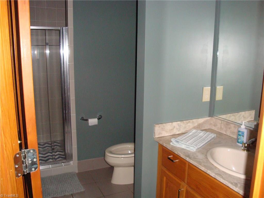 5342 Fred Lineberry Road Randleman, NC 27317 - Photo 10 of 16 SEPARATE SHOWER IN MASTER BATH WITH SEPARATE SINK