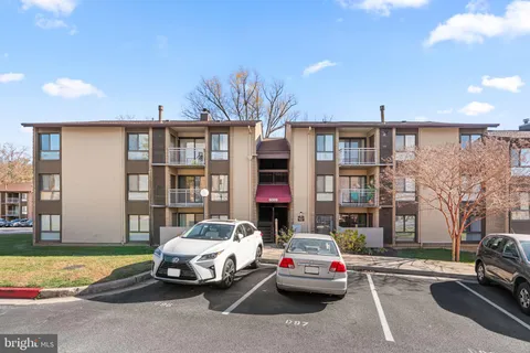 a car parked in front of a building