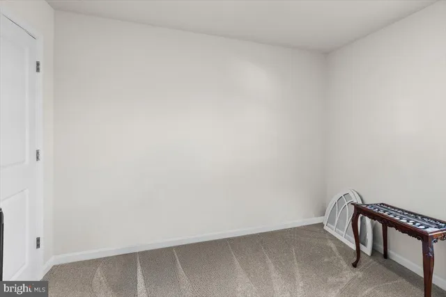 a view of a room with a bench