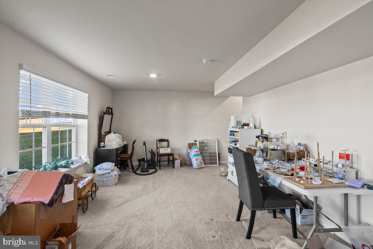 4310 Brent Dr Spring Grove Spring Grove, PA 17362 - Photo 35 of 36 a dining room with furniture and a floor to ceiling window