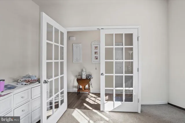 a view of bedroom with windows