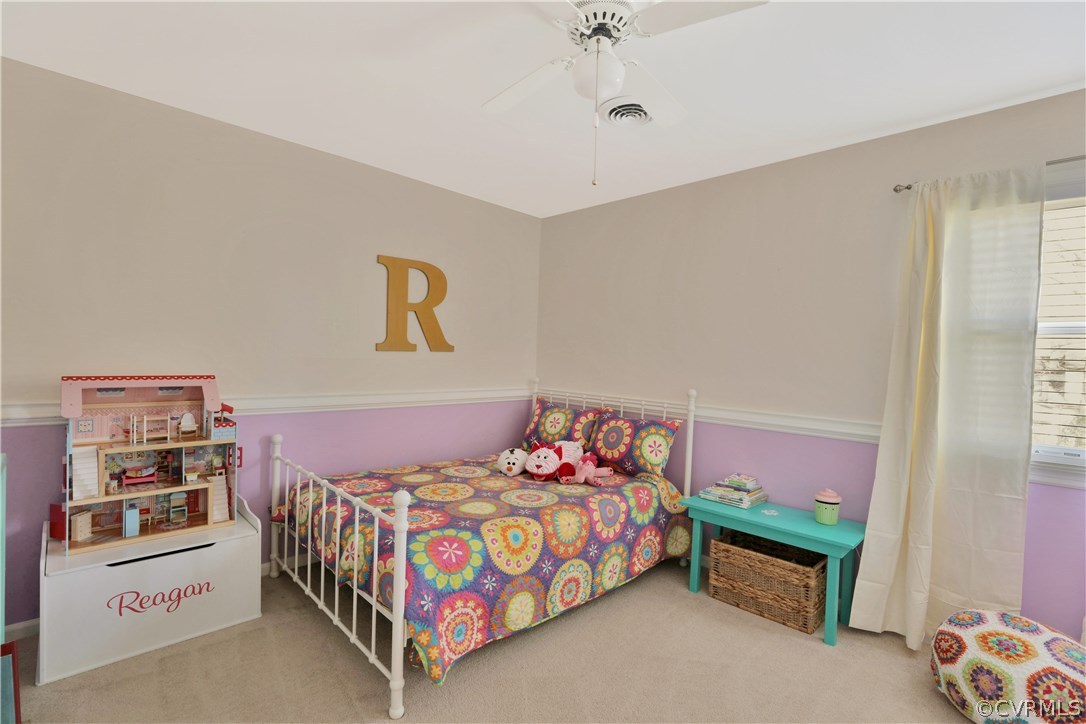 11451 Driscoll Road Chester, VA 23831 - Photo 15 of 25 a bedroom with a bed and a dresser
