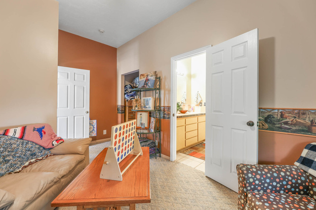 569 Elk Meadow Loop Tooele, UT 84074 - Photo 36 of 56 Living area with light carpet