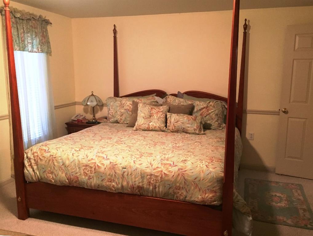 170 Kelleytown Road Bernard, ME 04612 - Photo 21 of 33 A king-sized master bedroom