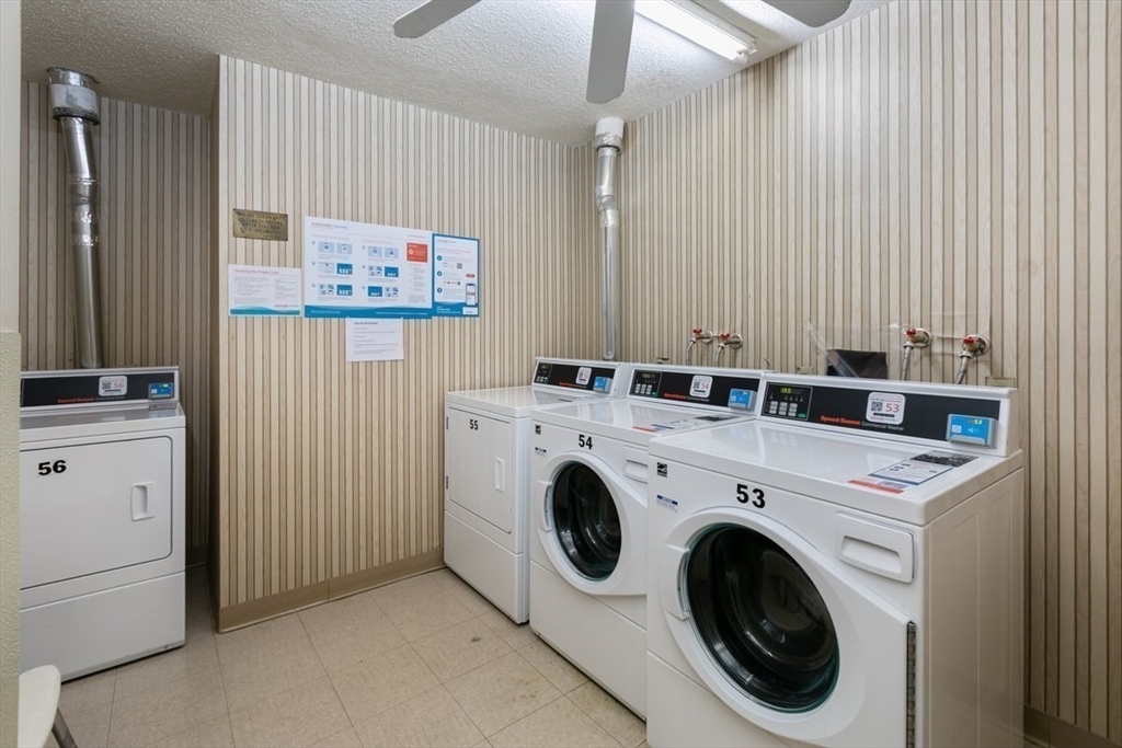 1008 Paradise Road, Unit 2E Swampscott, MA 01907 - Photo 17 of 22 a utility room with dryer and washer