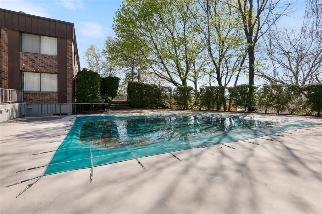 1008 Paradise Road, Unit 2E Swampscott, MA 01907 - Photo 21 of 22 a view of backyard with green space