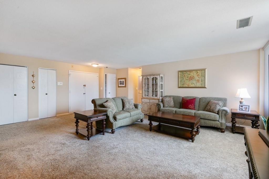 1008 Paradise Road, Unit 2E Swampscott, MA 01907 - Photo 4 of 22 a living room with furniture