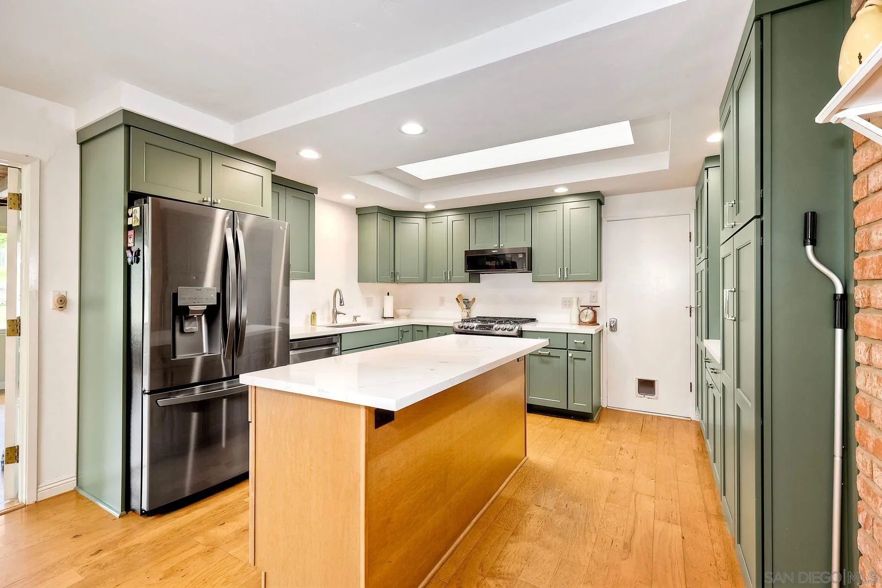 1915 Rockhoff Road Escondido, CA 92026 - Photo 12 of 43 a kitchen with stainless steel appliances a refrigerator and a stove