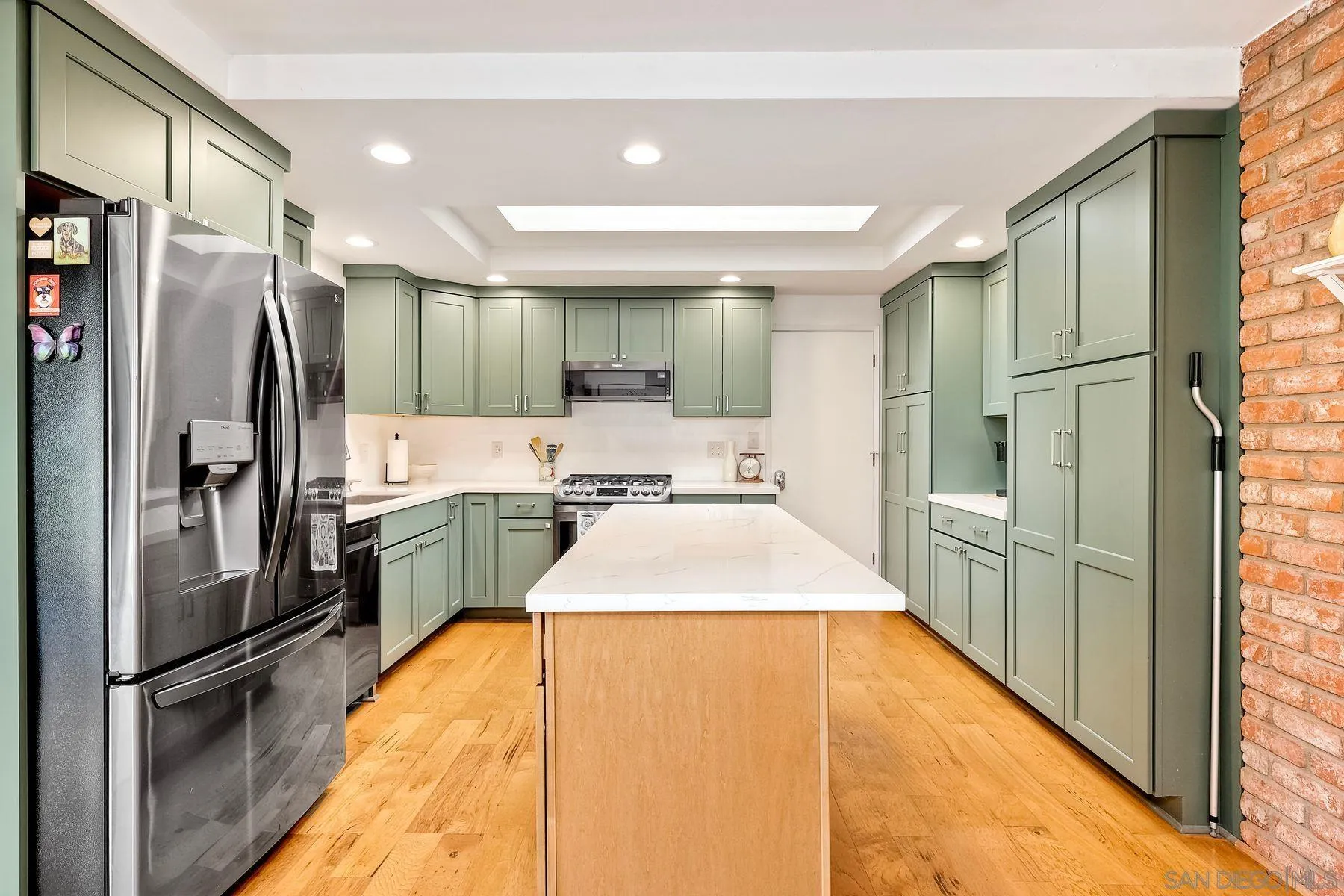 1915 Rockhoff Road Escondido, CA 92026 - Photo 13 of 43 a large kitchen with a refrigerator a sink and dishwasher