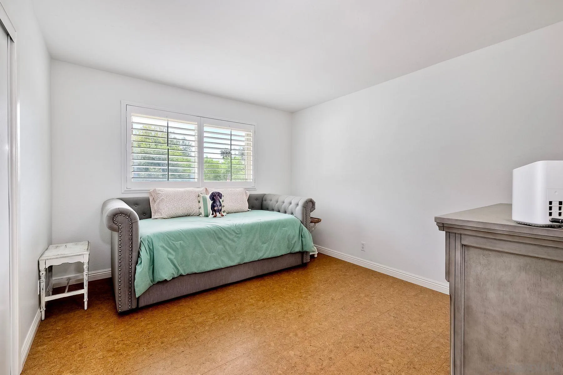 1915 Rockhoff Road Escondido, CA 92026 - Photo 23 of 43 a bedroom with a bed and a window