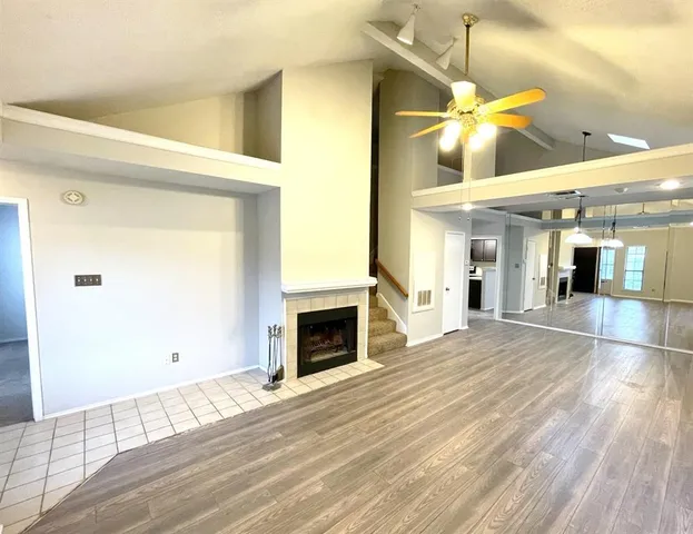 a view of an entryway and livingroom