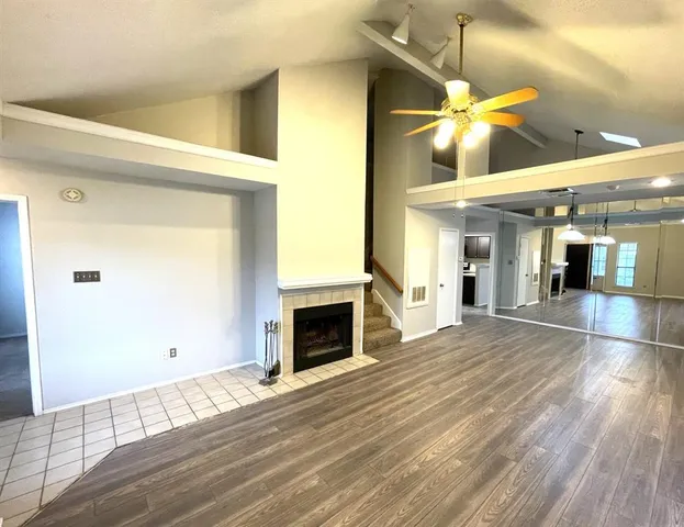 a view of an entryway and livingroom