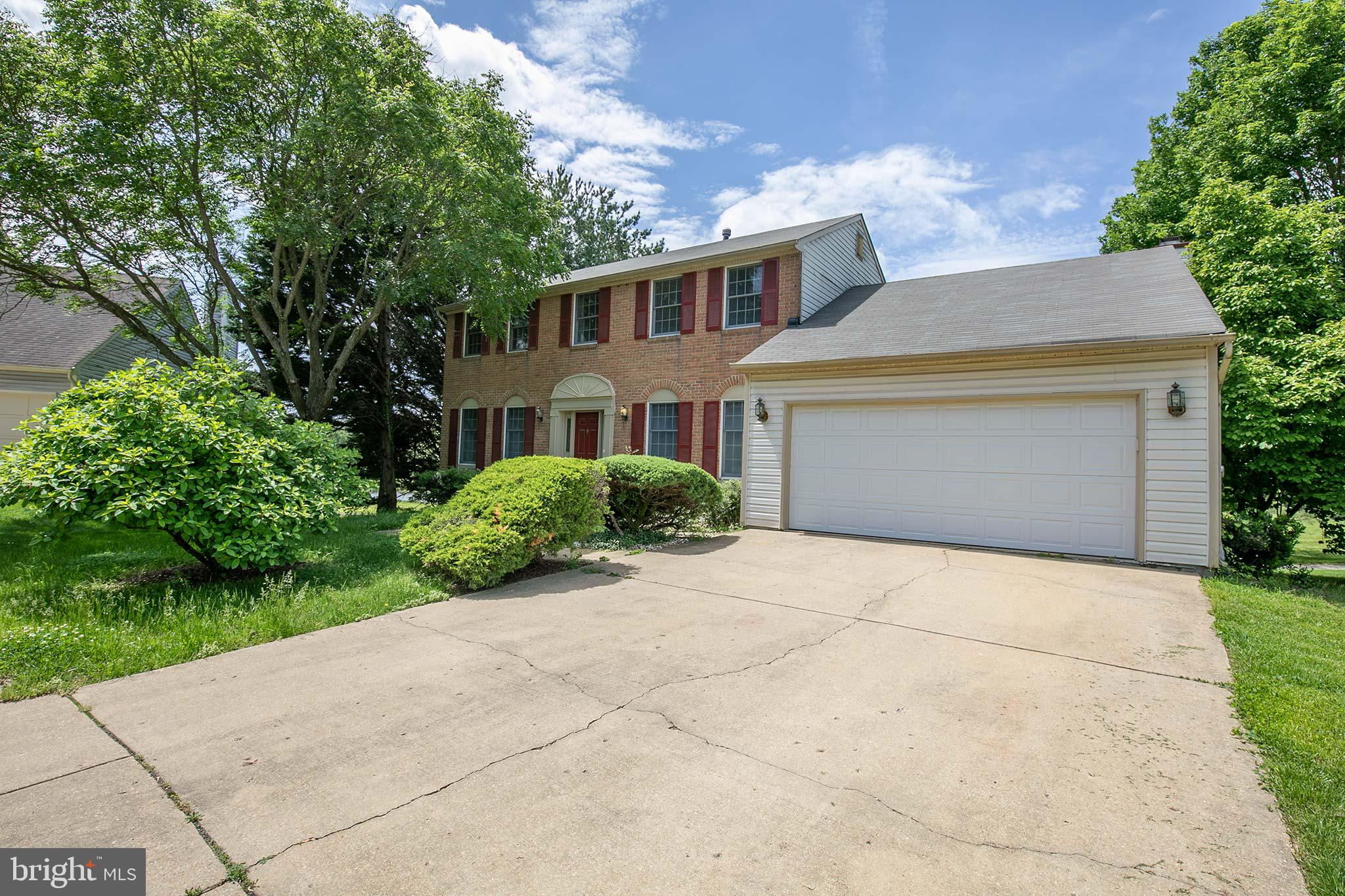 10801 Golf Course Court Bowie, MD 20721 - Photo 3 of 52 a house view with a garden space