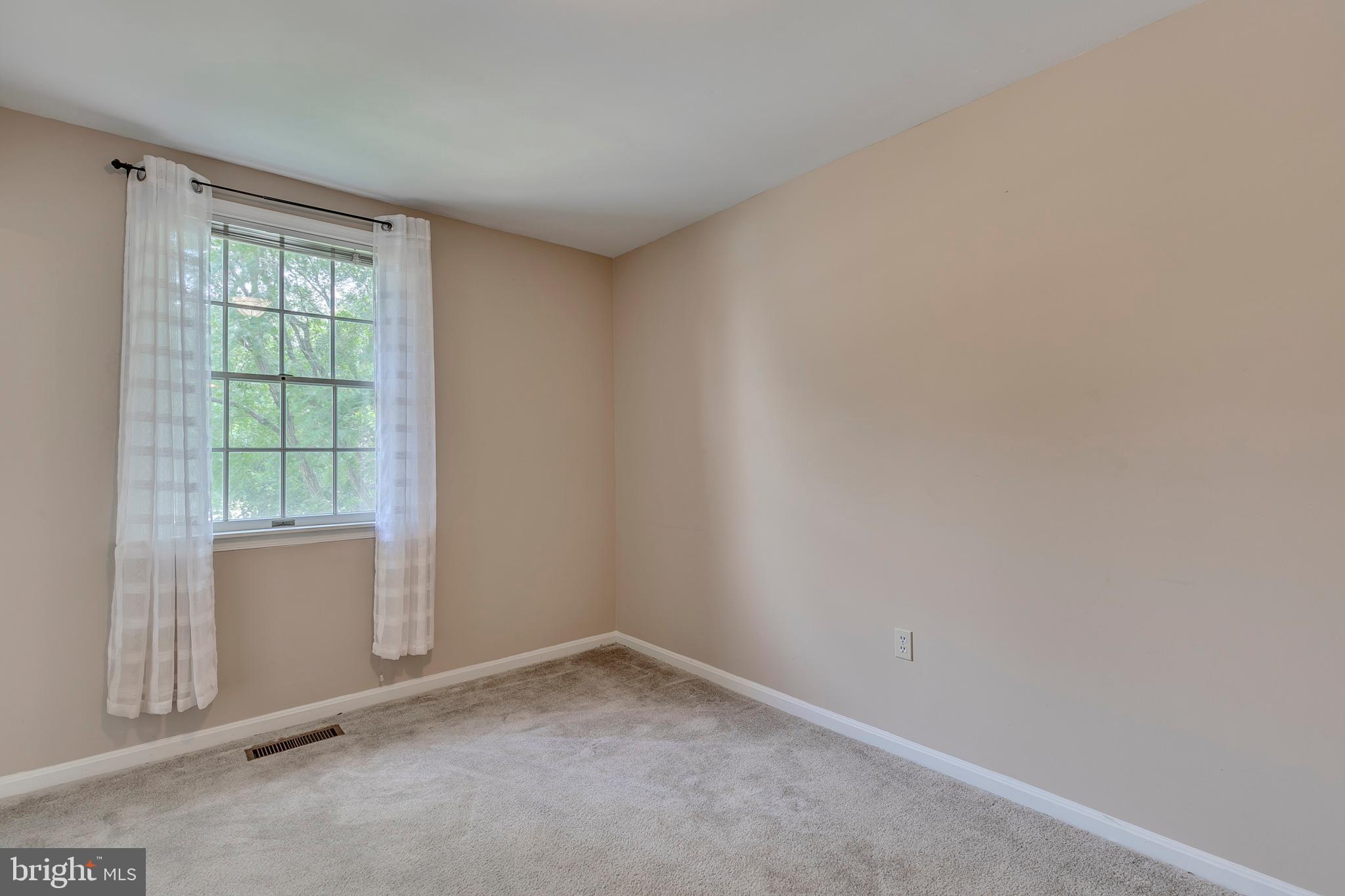 10801 Golf Course Court Bowie, MD 20721 - Photo 25 of 52 an empty room with windows