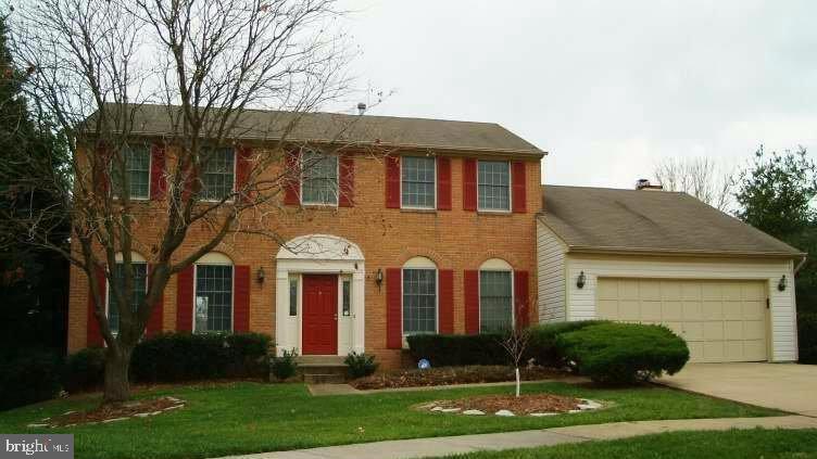 10801 Golf Course Court Bowie, MD 20721 - Photo 4 of 52 front view of a house with a yard