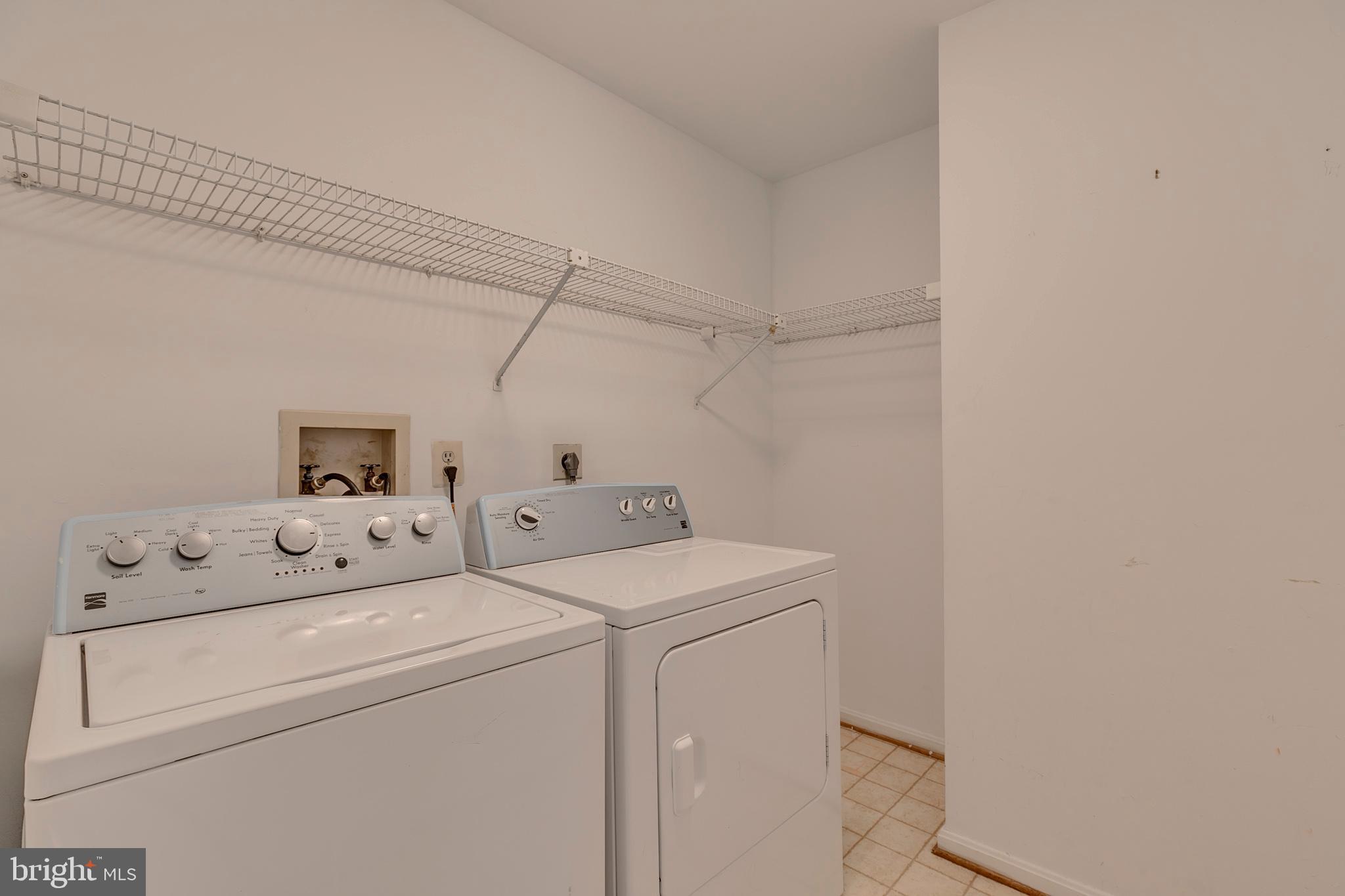 10801 Golf Course Court Bowie, MD 20721 - Photo 33 of 52 a utility room with dryer and washer