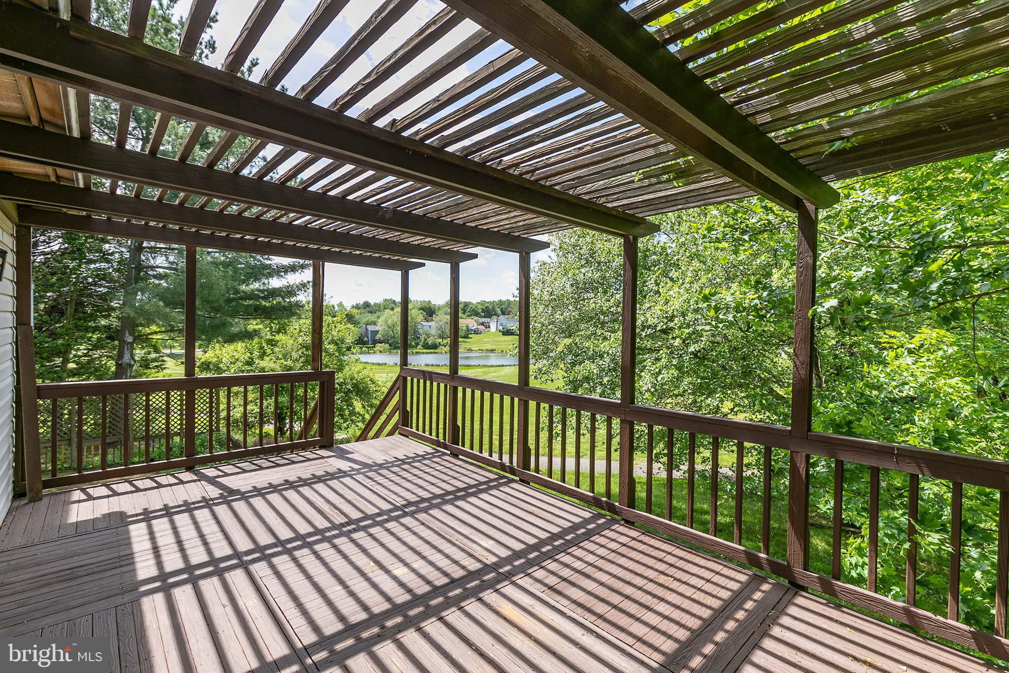10801 Golf Course Court Bowie, MD 20721 - Photo 42 of 52 a view of a balcony with wooden floor