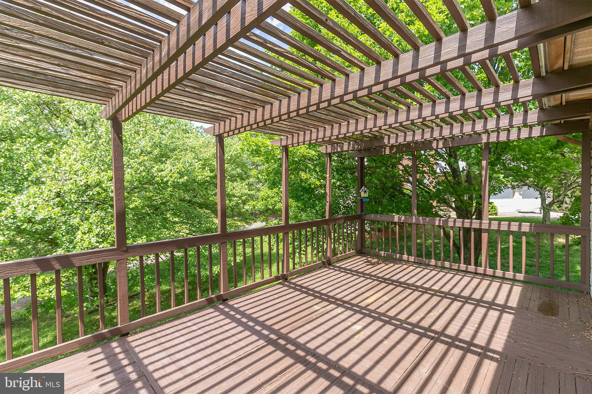 10801 Golf Course Court Bowie, MD 20721 - Photo 43 of 52 a balcony with trees in front of it