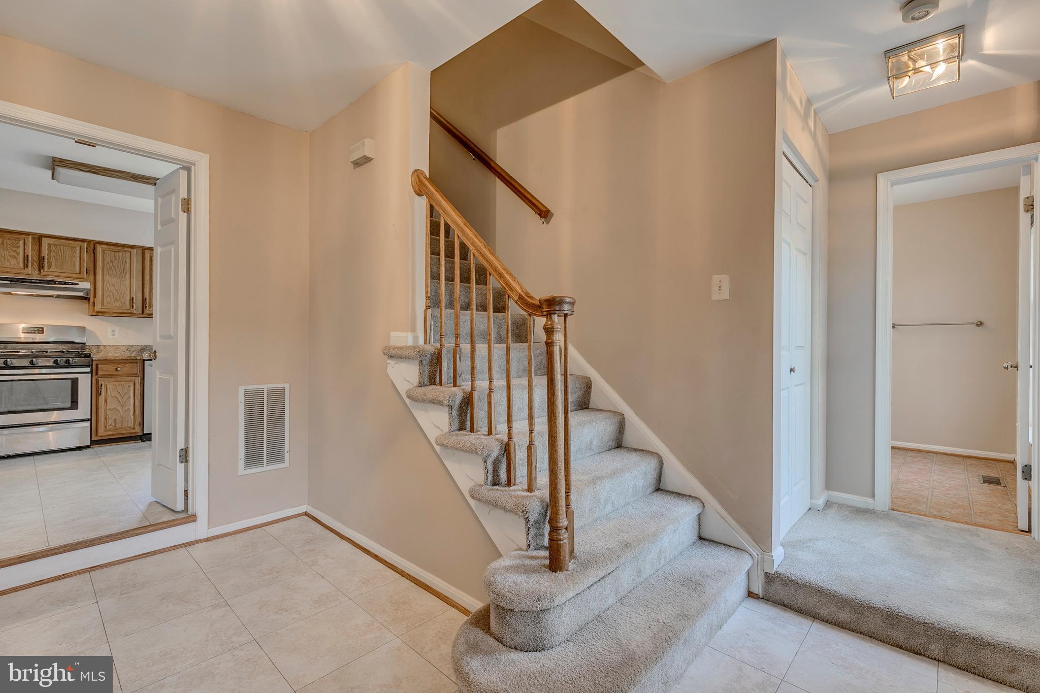 10801 Golf Course Court Bowie, MD 20721 - Photo 6 of 52 a view of a hallway view with staircase