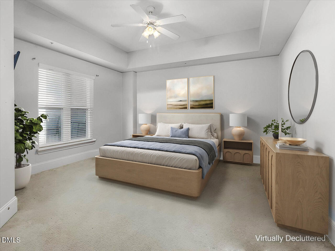 222 Glenwood Avenue, Unit 304 Raleigh, NC 27603 - Photo 17 of 23 a bedroom with a large bed and a chandelier