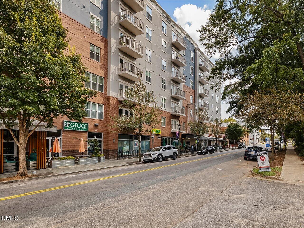 222 Glenwood Avenue, Unit 304 Raleigh, NC 27603 - Photo 22 of 23 a view of a street with cars