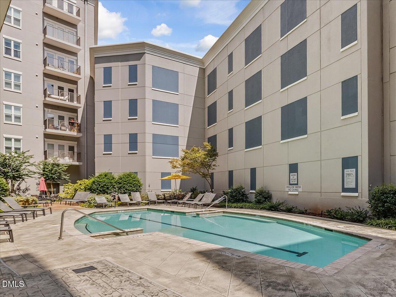 222 Glenwood Avenue, Unit 304 Raleigh, NC 27603 - Photo 7 of 23 a house view with a garden space
