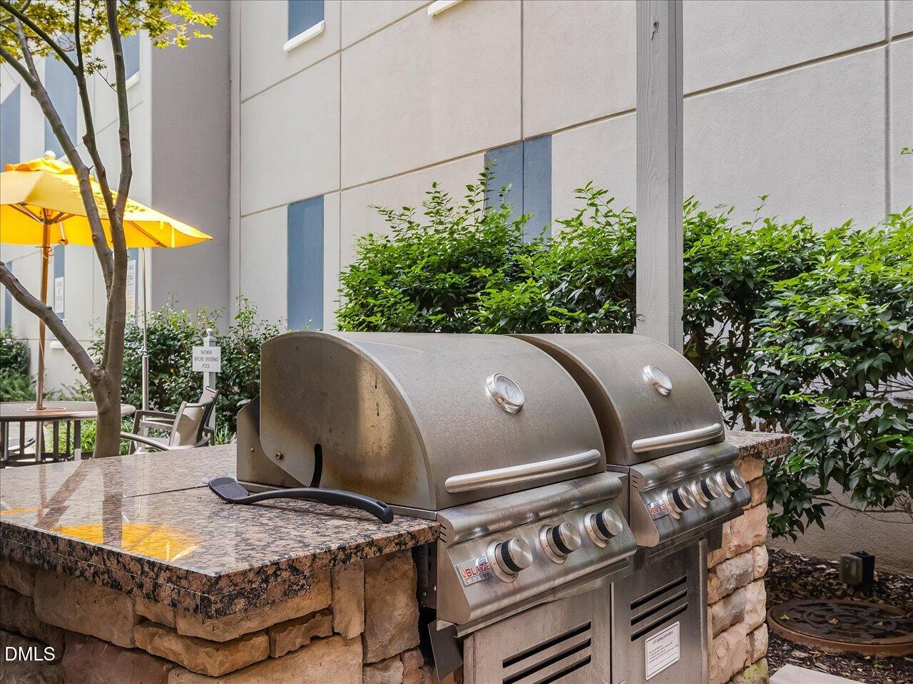 222 Glenwood Avenue, Unit 304 Raleigh, NC 27603 - Photo 9 of 23 a view of outdoor space and patio