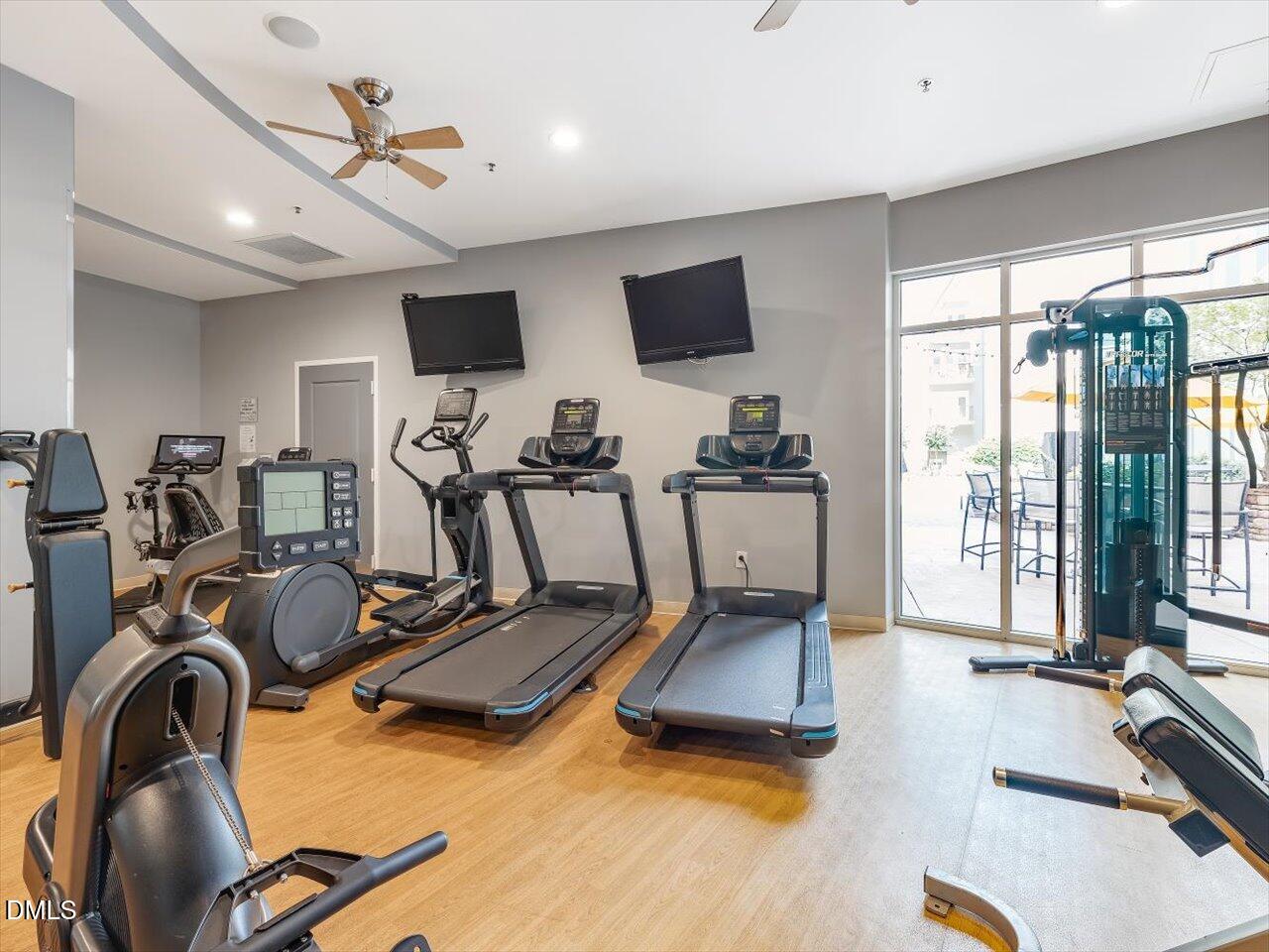 222 Glenwood Avenue, Unit 304 Raleigh, NC 27603 - Photo 10 of 23 a view of a room with gym equipment