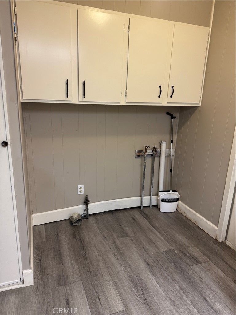 2751 Reche Canyon Road, Unit 185 Moreno Valley, CA 92555 - Photo 9 of 17 a view of wooden floor and cabinet