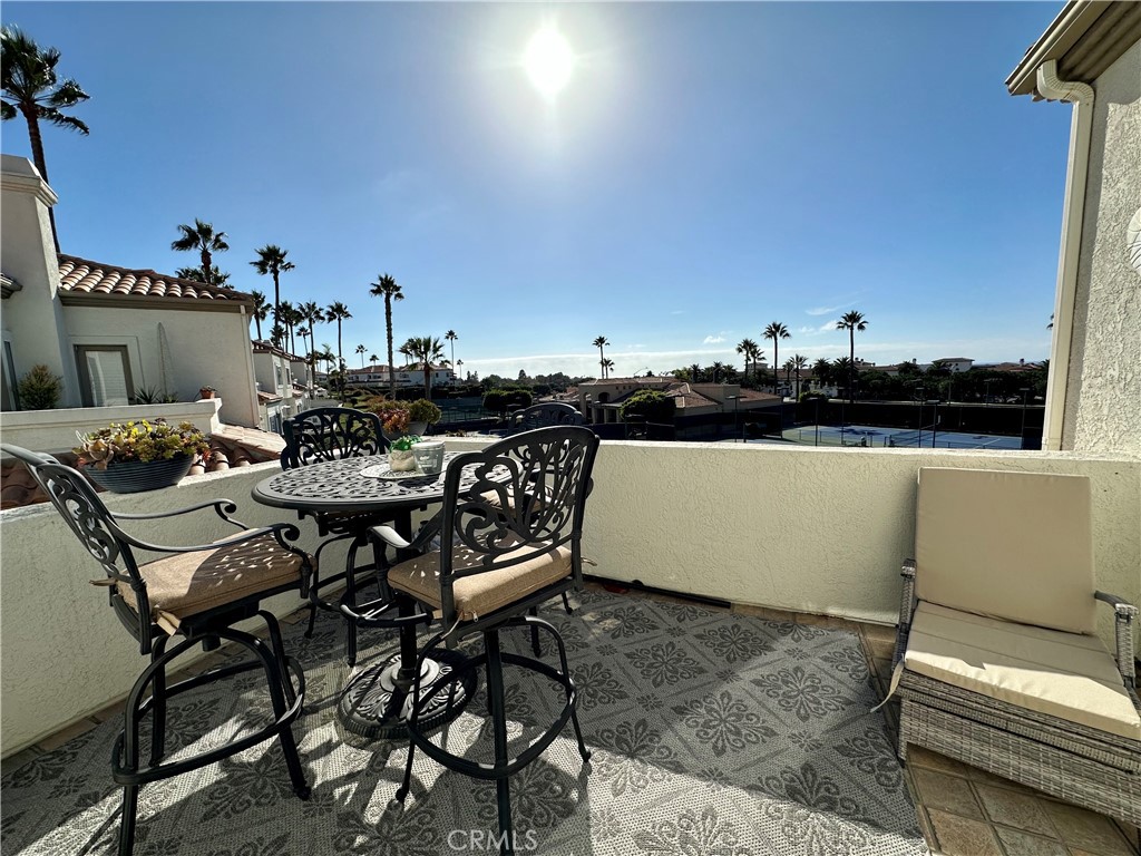17 Centre Court, Unit 86 Dana Point, CA 92629 - Photo 11 of 21 a terrace of a house with outdoor seating