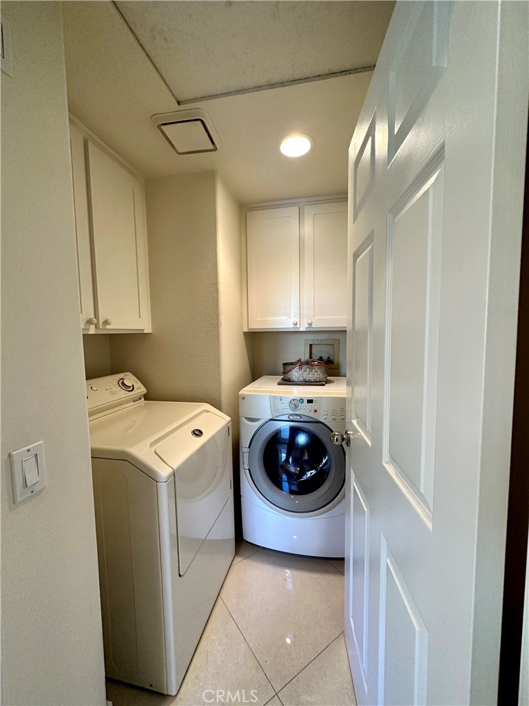 17 Centre Court, Unit 86 Dana Point, CA 92629 - Photo 19 of 21 a utility room with dryer and washer