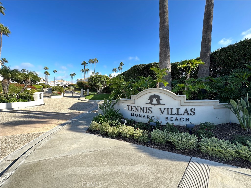 17 Centre Court, Unit 86 Dana Point, CA 92629 - Photo 21 of 21 a sign that is on the side of a road