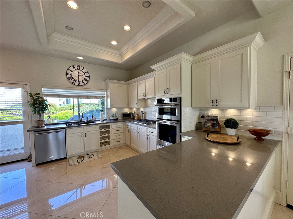 17 Centre Court, Unit 86 Dana Point, CA 92629 - Photo 7 of 21 a kitchen with counter space cabinets and appliances