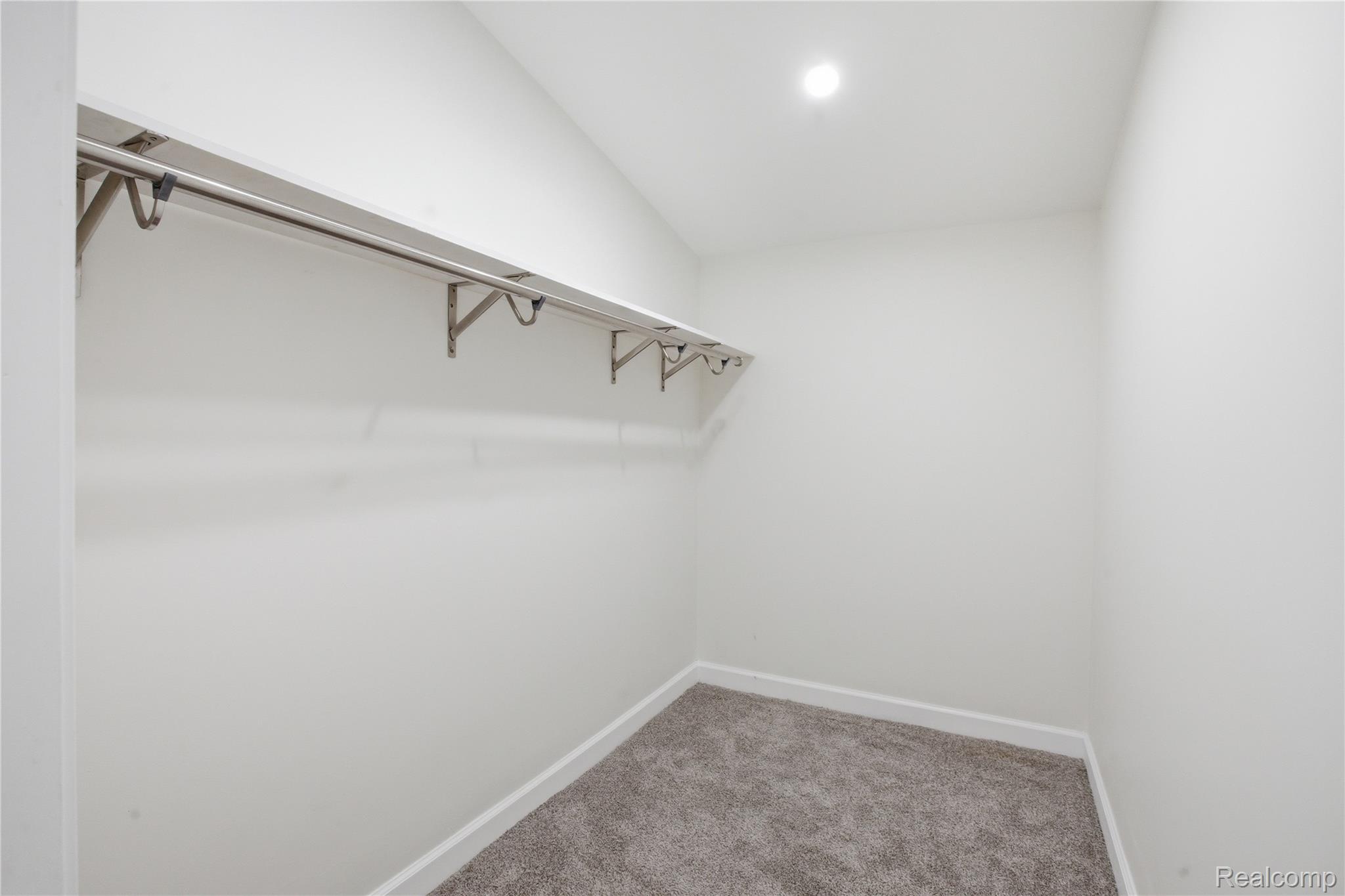 5350 List Road Grass Lake, MI 49240 - Photo 23 of 71 Walk in closet featuring light colored carpet