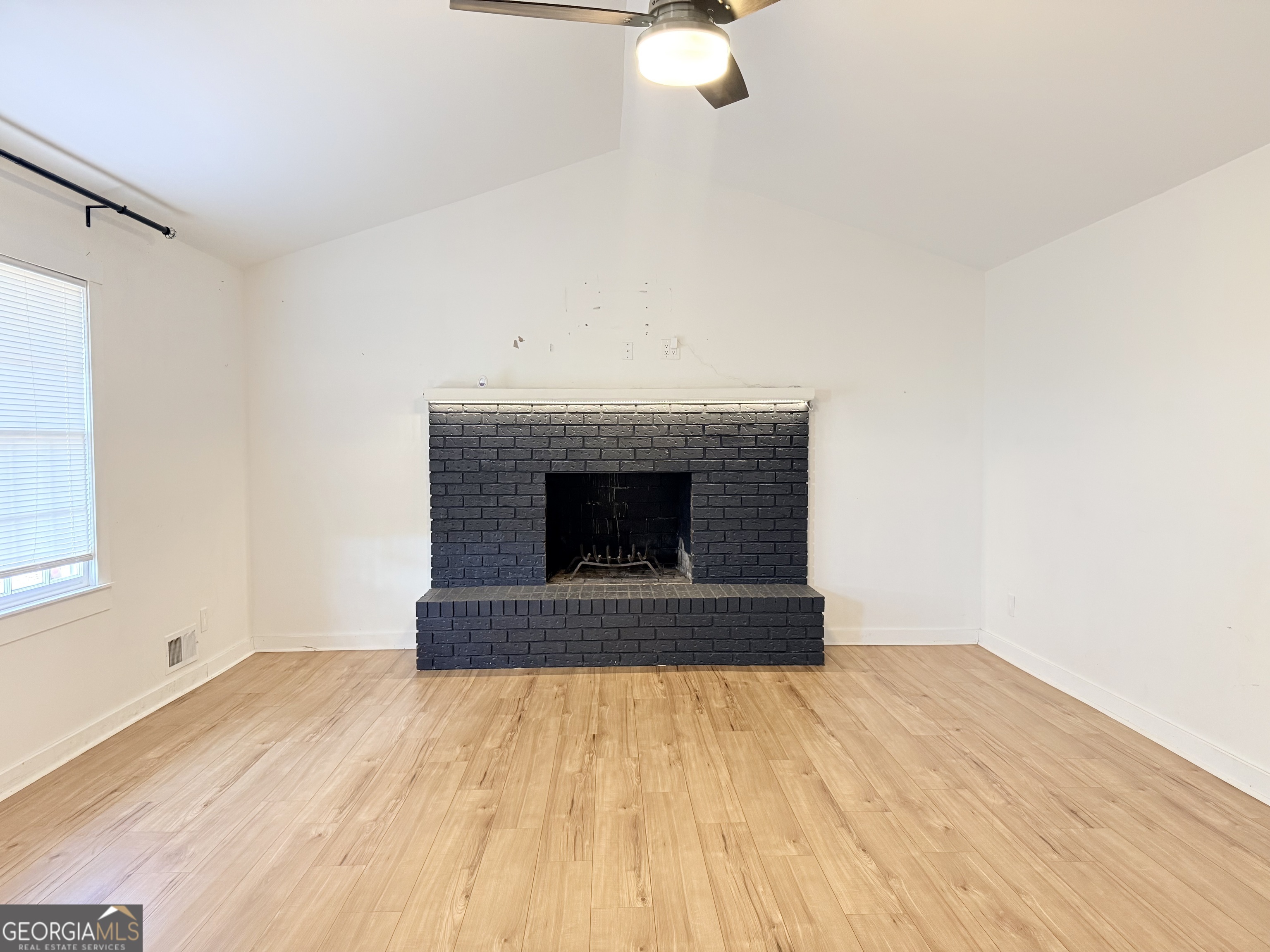 239 Pope Street Zebulon, GA 30295 - Photo 5 of 18 Fireplace is decorative only.