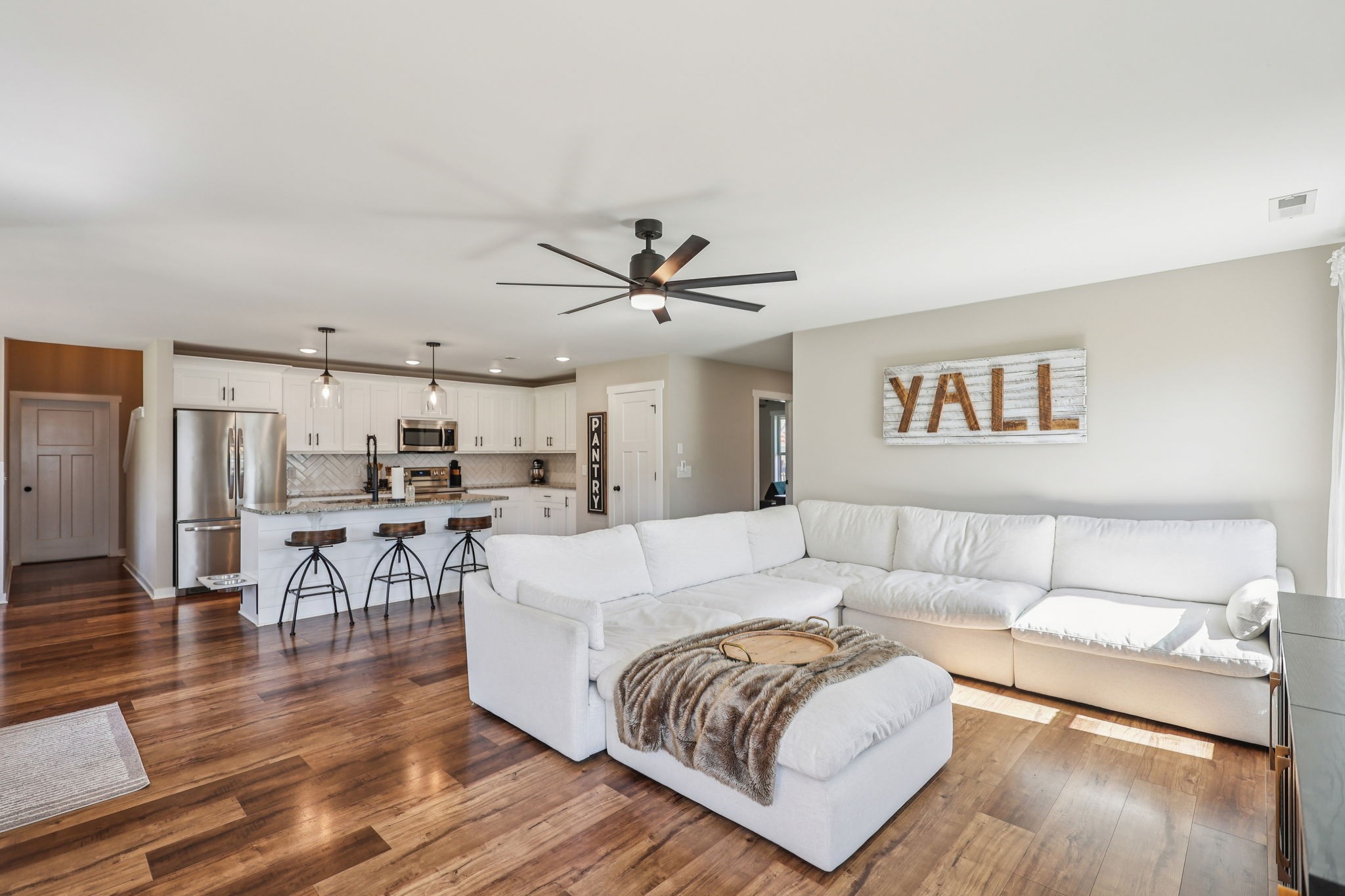 310 Skipping Stone Road Christiana, TN 37037 - Photo 13 of 50 a living room with furniture and view of kitchen