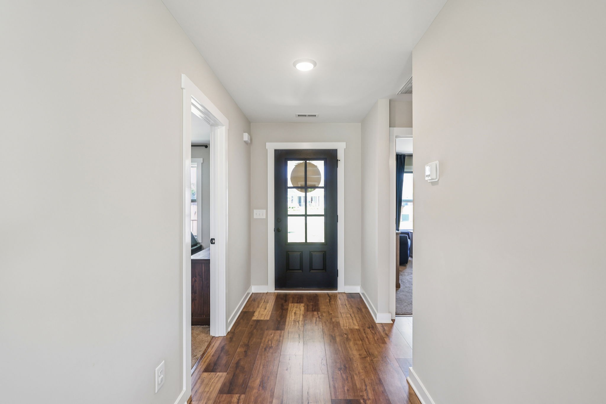 310 Skipping Stone Road Christiana, TN 37037 - Photo 18 of 50 a view of a hallway with wooden floor and a window