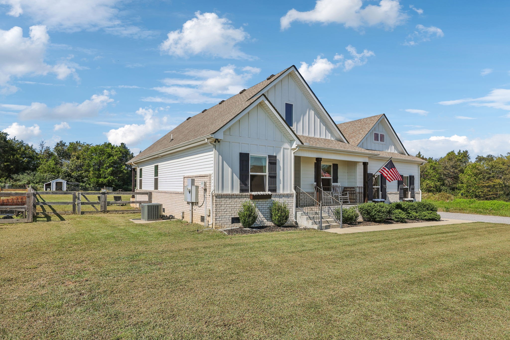 310 Skipping Stone Road Christiana, TN 37037 - Photo 2 of 50 a front view of house with yard outdoor seating and barbeque oven