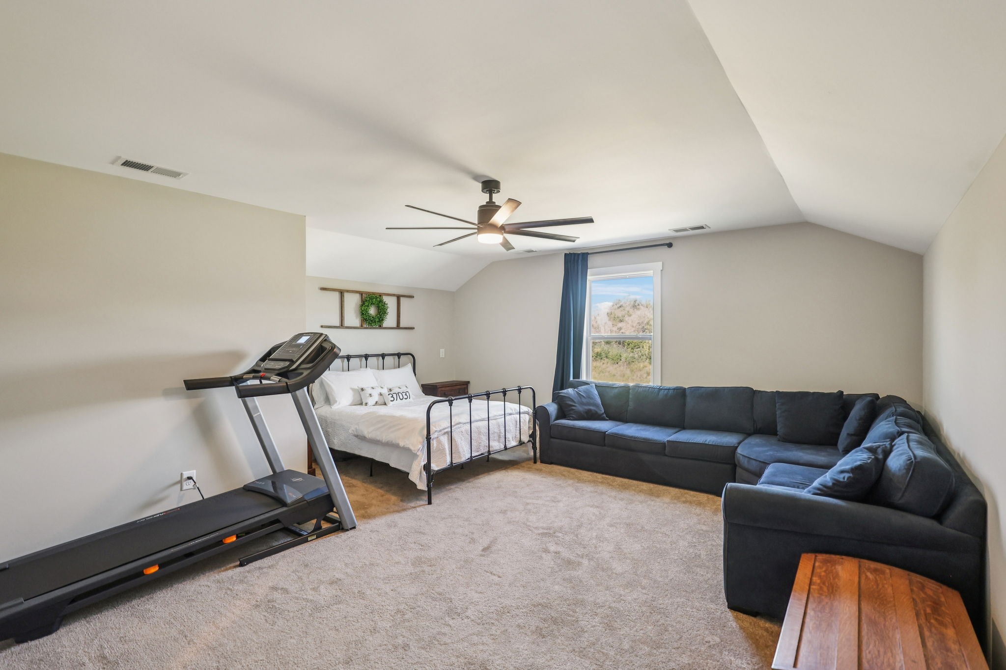 310 Skipping Stone Road Christiana, TN 37037 - Photo 26 of 50 a living room with furniture and a window