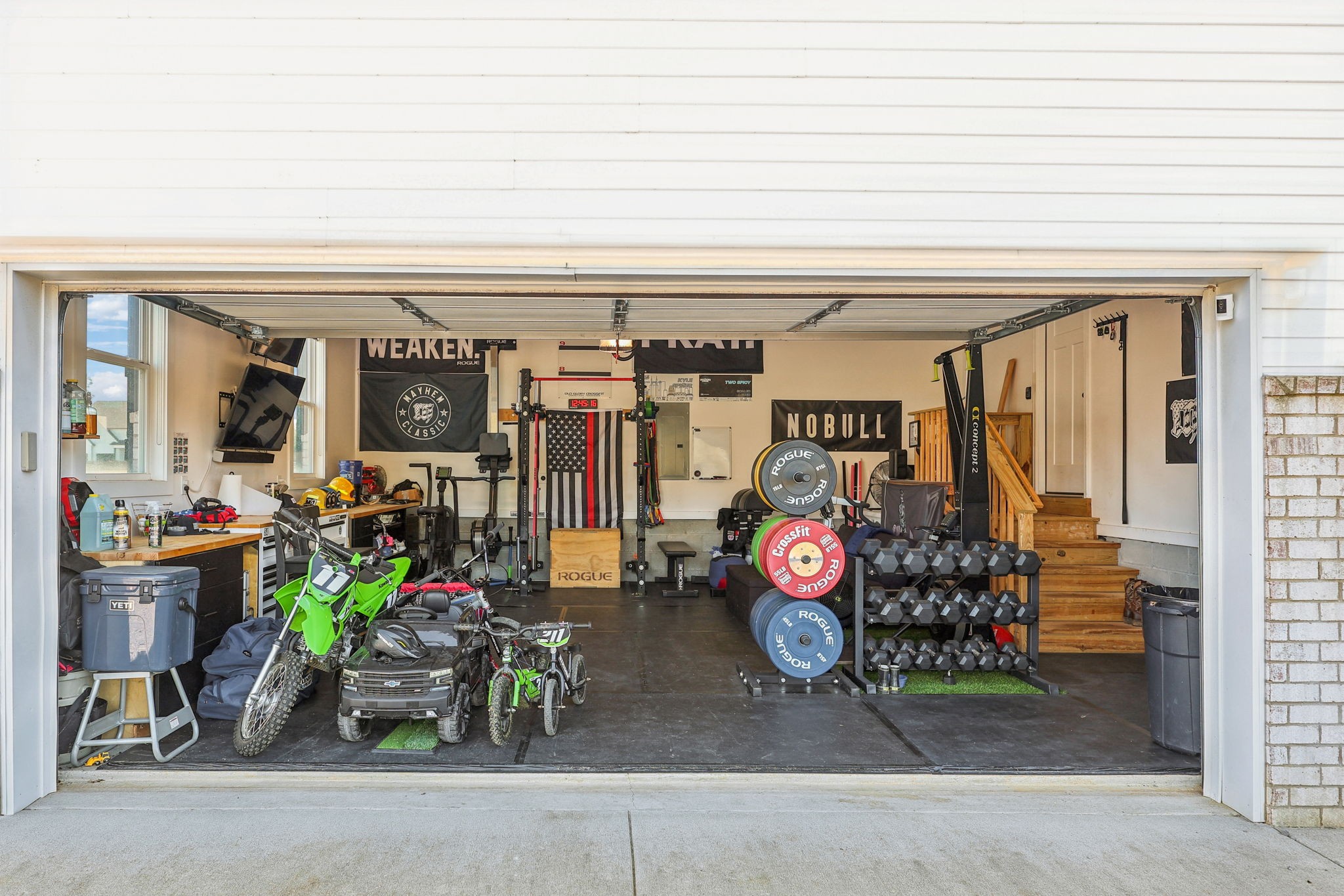 310 Skipping Stone Road Christiana, TN 37037 - Photo 31 of 50 a view of a garage with a bike and car