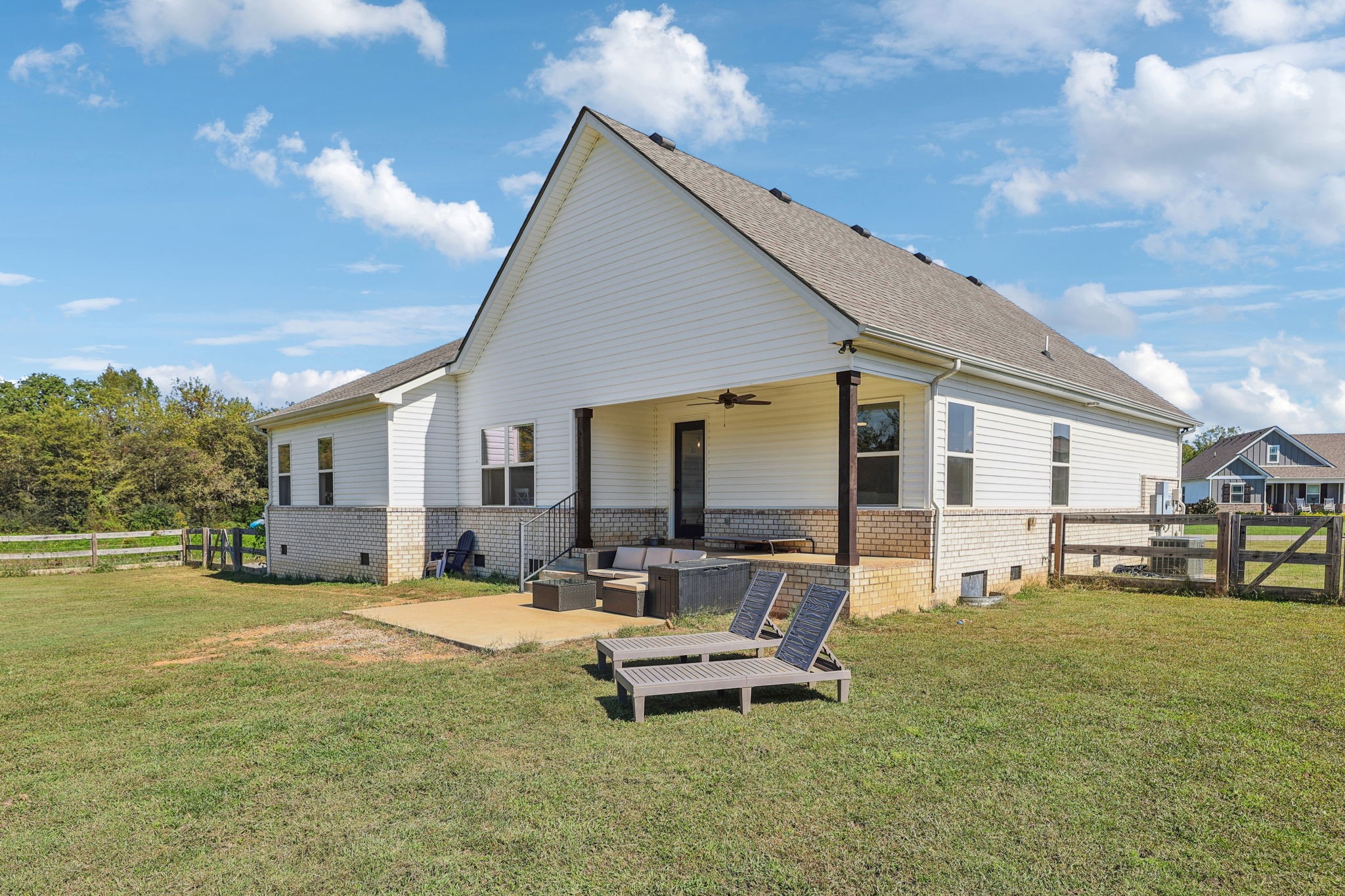 310 Skipping Stone Road Christiana, TN 37037 - Photo 34 of 50 a view of a house with backyard and sitting area