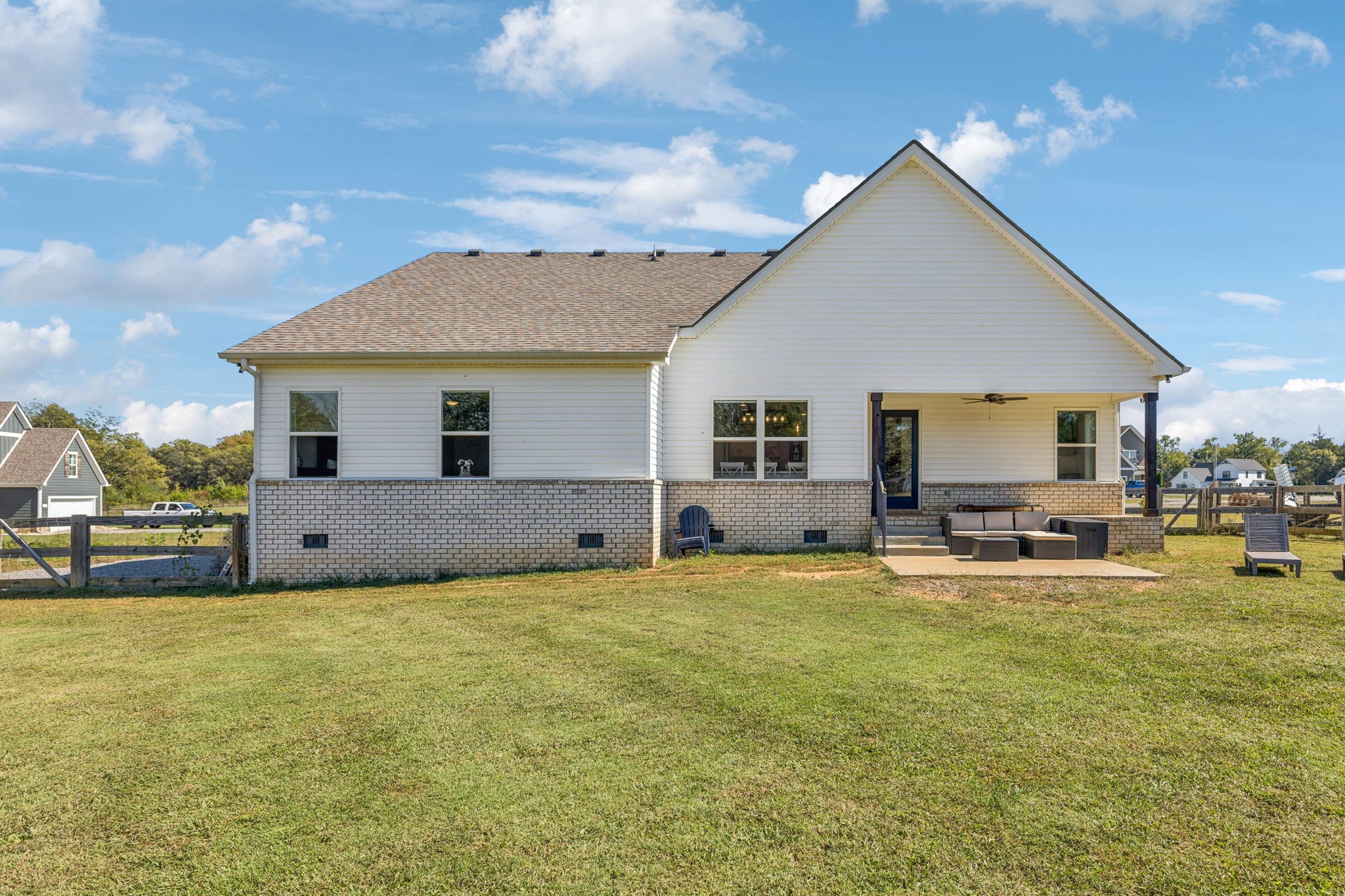 310 Skipping Stone Road Christiana, TN 37037 - Photo 35 of 50 a view of a house with a yard patio and swimming pool