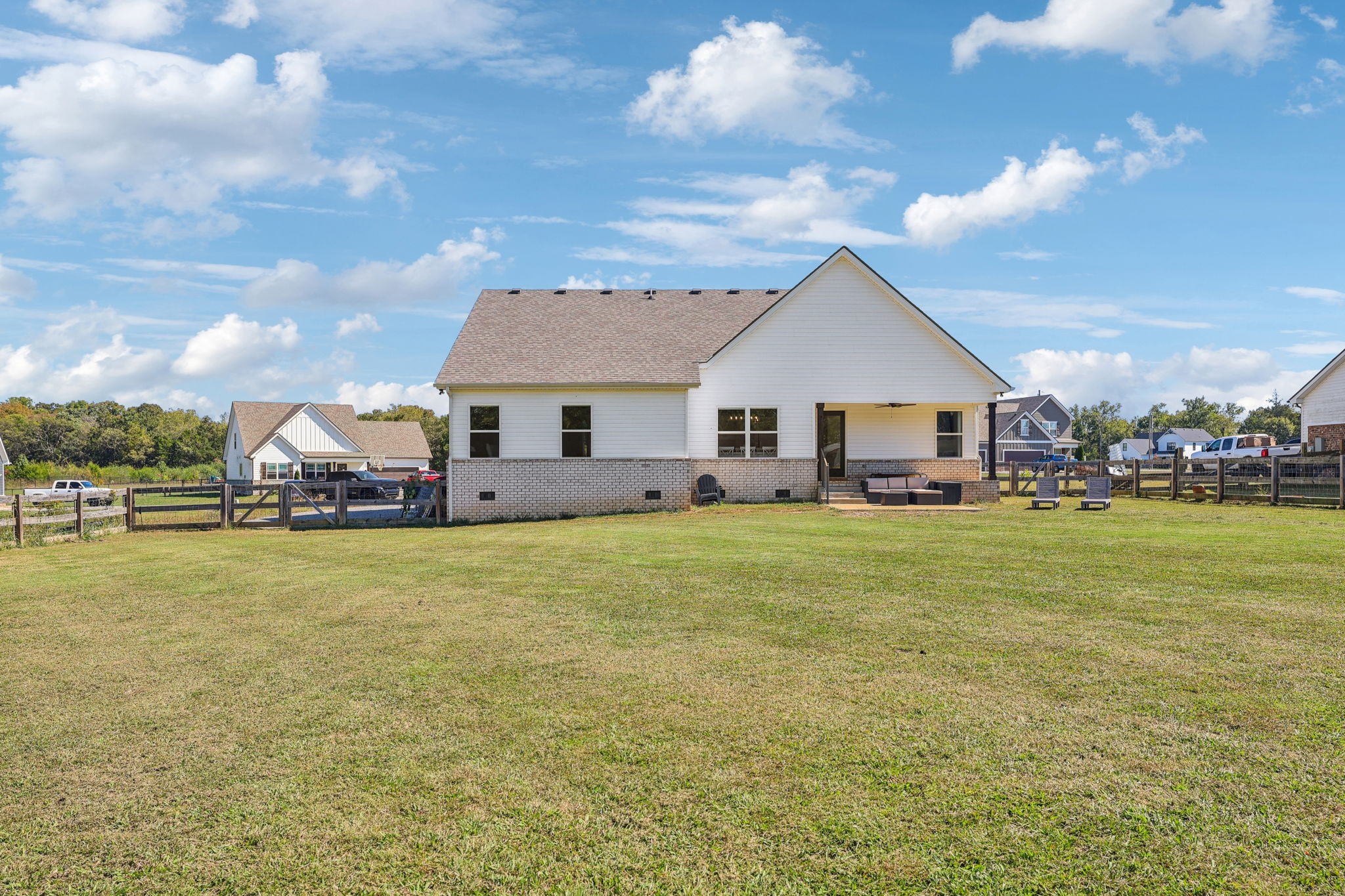 310 Skipping Stone Road Christiana, TN 37037 - Photo 36 of 50 a front view of house with an outdoor space and seating