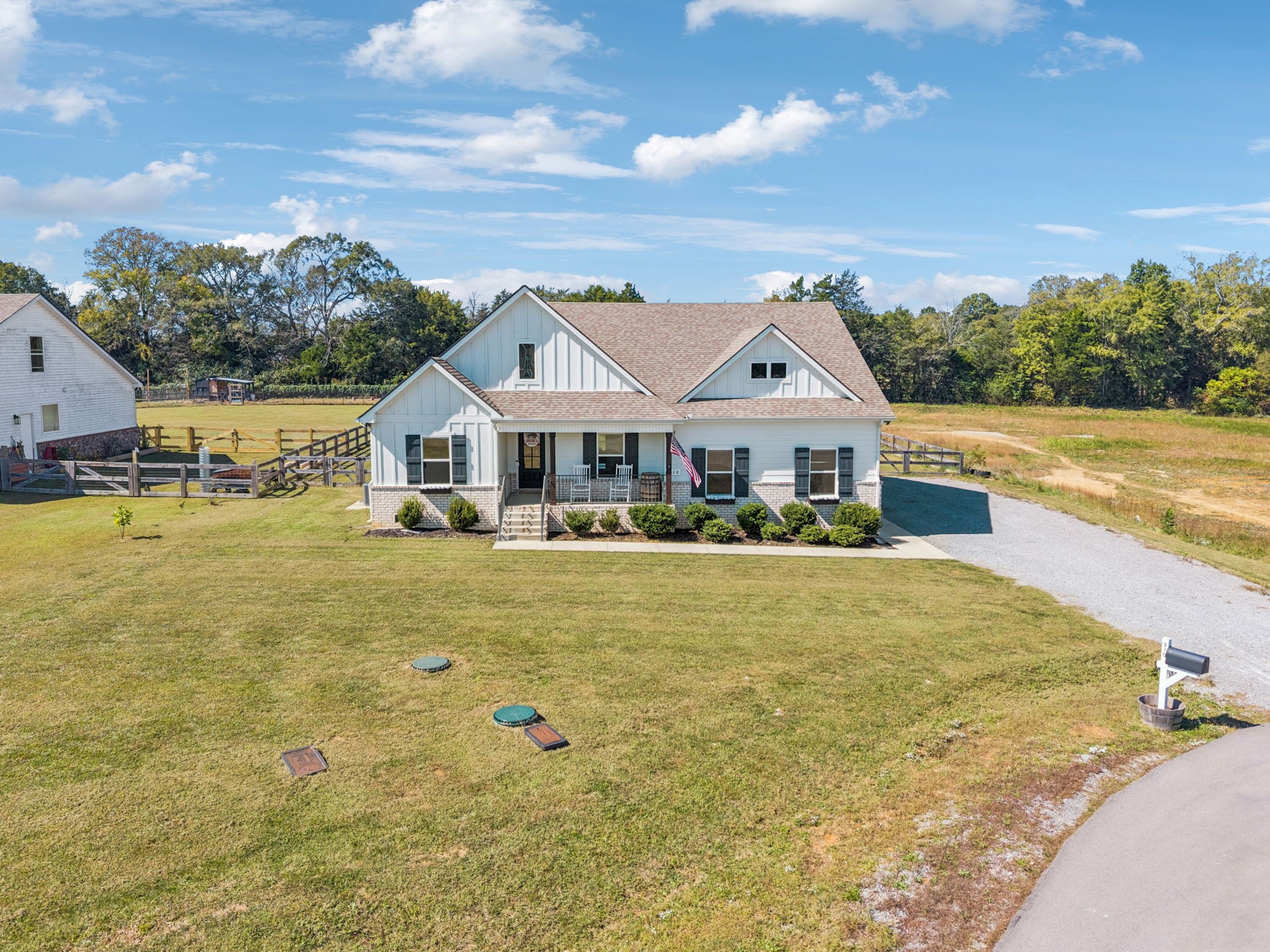 310 Skipping Stone Road Christiana, TN 37037 - Photo 40 of 50 a front view of house with swimming pool and green space