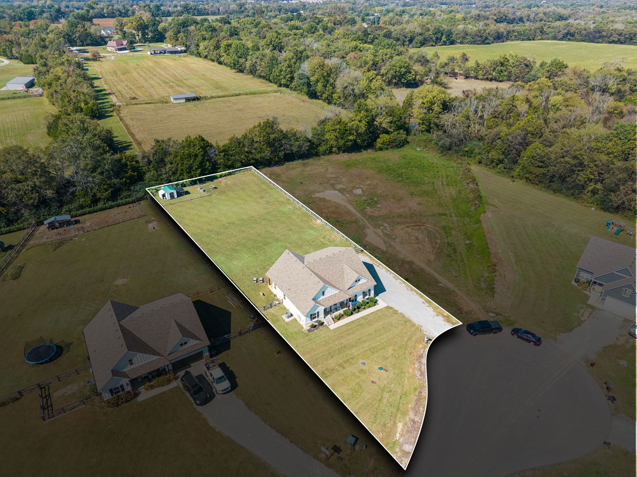310 Skipping Stone Road Christiana, TN 37037 - Photo 42 of 50 an aerial view of a house with a yard