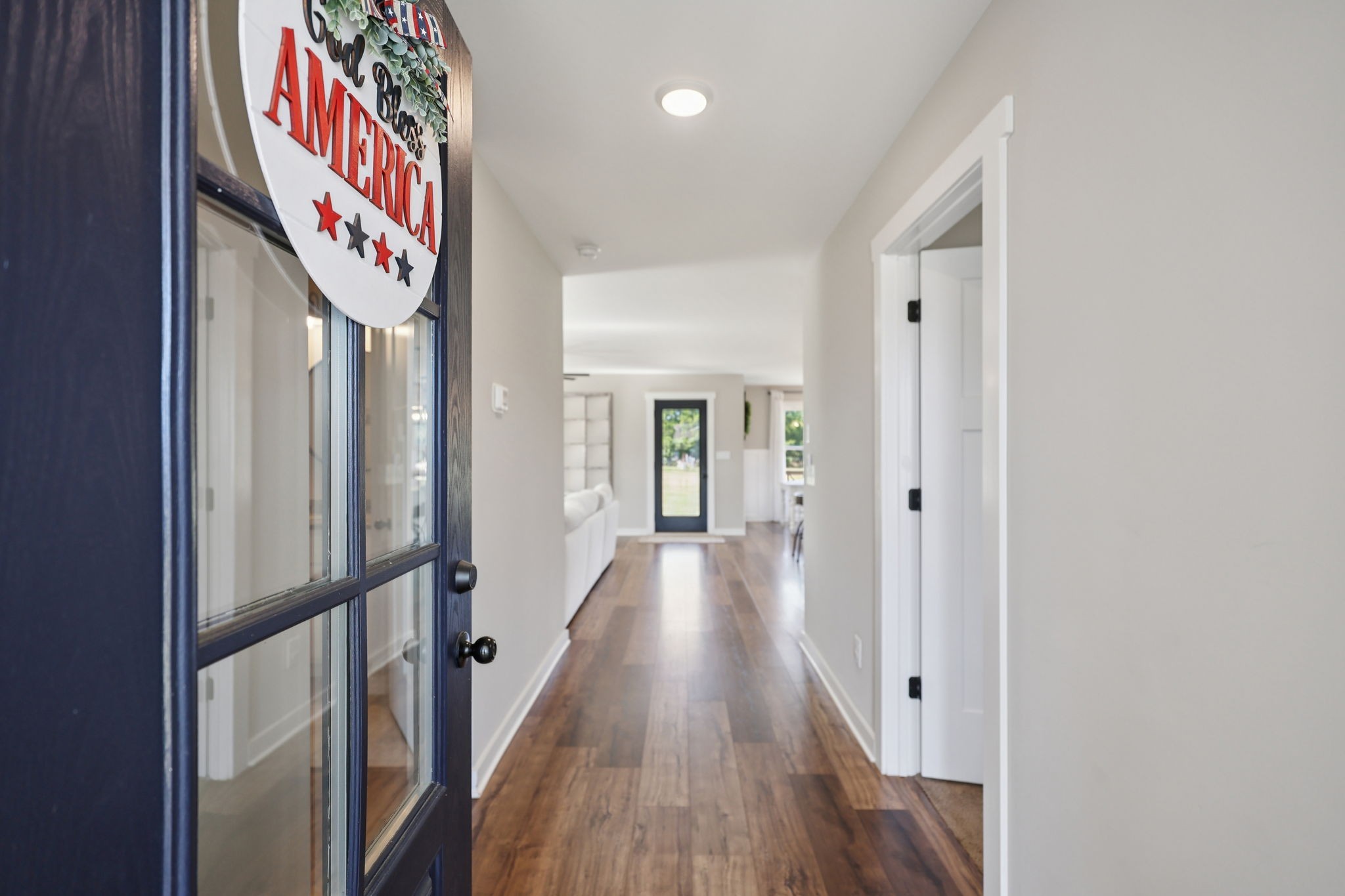310 Skipping Stone Road Christiana, TN 37037 - Photo 5 of 50 a view of a hallway with wooden floor and staircase
