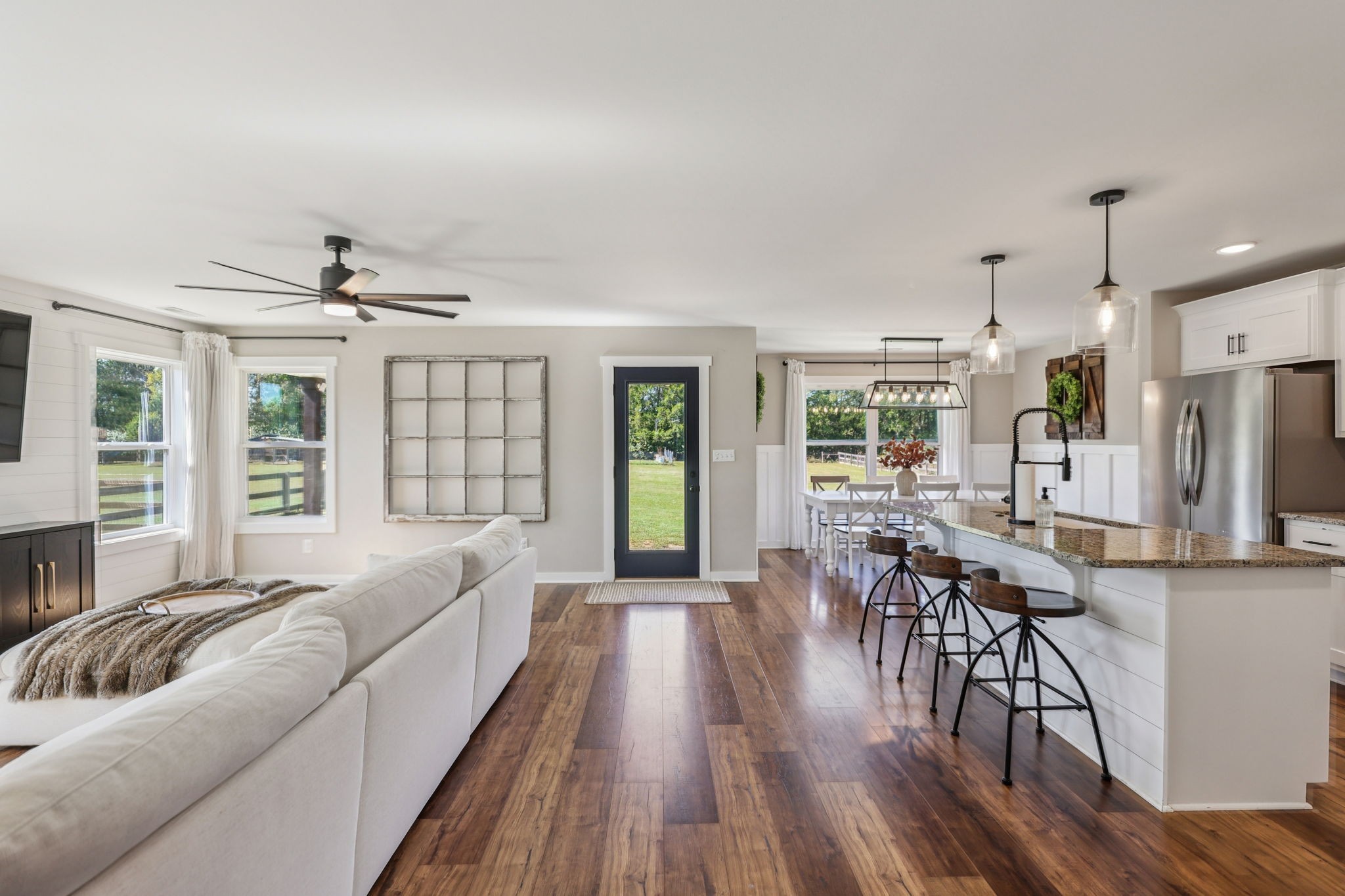 310 Skipping Stone Road Christiana, TN 37037 - Photo 6 of 50 a living room with furniture and a wooden floor