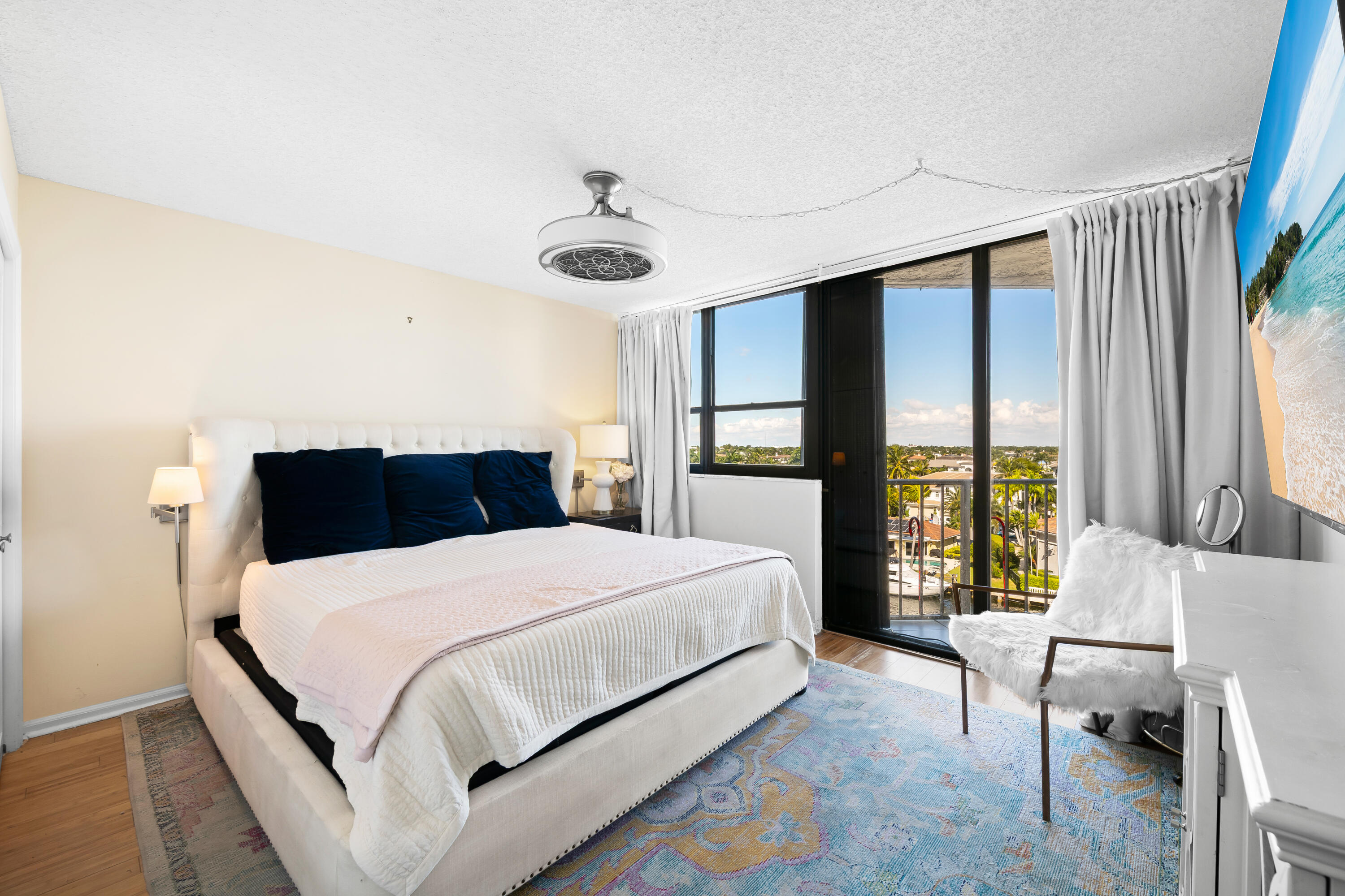 899 Jeffery Street, Unit 614 Boca Raton, FL 33487 - Photo 25 of 60 a bedroom with a large bed and a large window